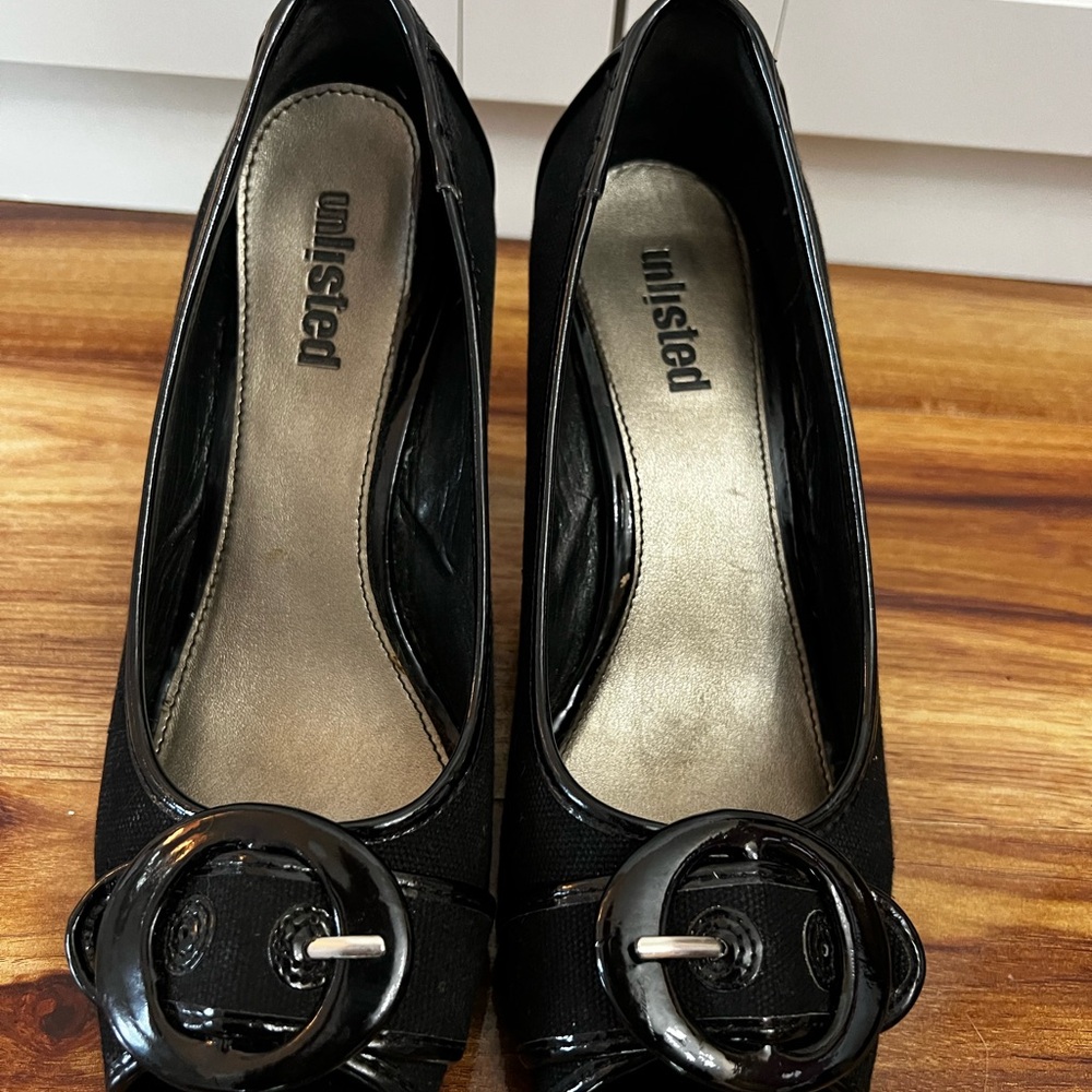 Unlisted Glossy Black Heels with Bold Buckle